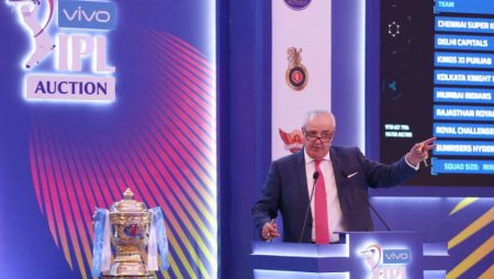 Hugh Edmeades the auctioneer for the 2022 IPL Auction, falls on stage.