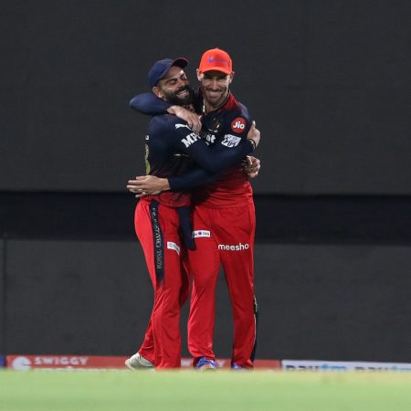 During an IPL match, Virat and Faf exchange a warm embrace.