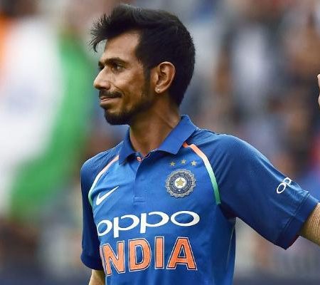 Yuzvendra Chahal smiles after being omitted from the T20I series against Australia