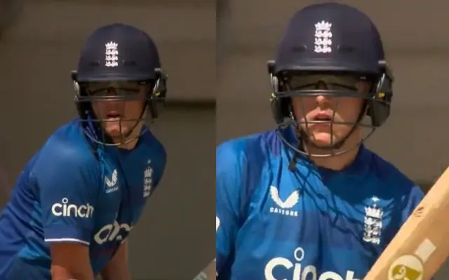 Sam Curran bats while wearing sunglasses.