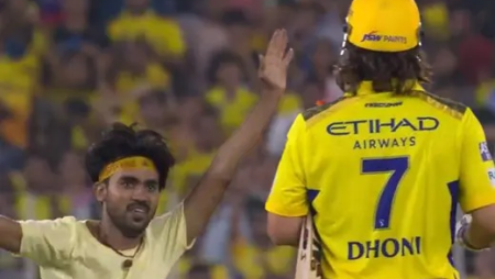 A fan invades the field to greet MS Dhoni during the GT versus CSK match